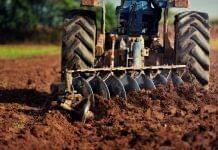 tractor turning soil