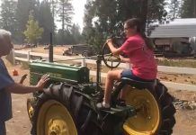girl riding tractor