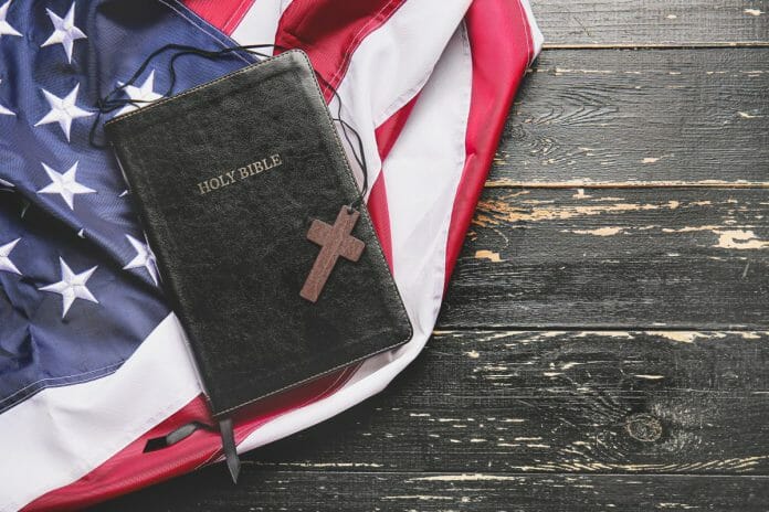 Bible resting on the American flag.